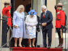 Governor General David Johnston broke royal protocol when he touched Queen Elizabeth’s elbow outside Canada House in London.