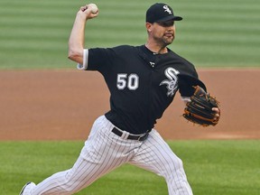 Chicago White Sox's starting pitcher Mike Pelfrey delivers against the Texas Rangers during the first inning of a baseball game in Chicago on Friday, June 30, 2017. (AP Photo/Matt Marton)