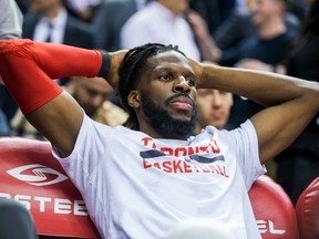 DeMarre Carroll sits on the bench in the final seconds of a loss to the San Antonio Spurs on Jan. 24.
