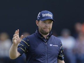 South Africa's Branden Grace celebrates his birdie on the 14th hole during the third round of the British Open Golf Championship, at Royal Birkdale, Southport, England, Saturday July 22, 2017. (AP Photo/Alastair Grant)