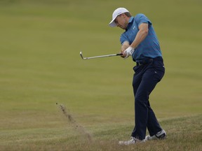 Jordan Spieth of the United States plays a shot on the 18th hole during a practice round ahead of the British Open Golf Championship, at Royal Birkdale, Southport, England Wednesday, July 19, 2017. (AP Photo/Alastair Grant)