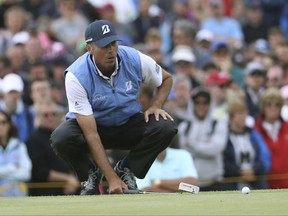 Matt Kuchar of the United States lines up a putt on the 9th green during the final round of the British Open Golf Championship, at Royal Birkdale, Southport, England, Sunday July 23, 2017. (AP Photo/Peter Morrison)
