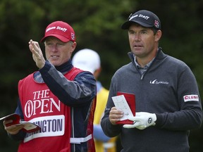 Ireland's Padraig Harrington looks along the 5th fairway with his caddie during the first round of the British Open Golf Championship, at Royal Birkdale, Southport, England Thursday, July 20, 2017. (AP Photo/Dave Thompson)