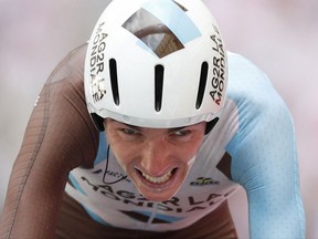France's Romain Bardet crosses the finish line in the twentieth stage of the Tour de France cycling race, an individual time trial over 22.5 kilometers (14 miles) with start and finish in Marseille, southern France, Saturday, July 22, 2017. (AP Photo/Christophe Ena)