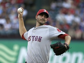 Boston Red Sox starting pitcher Rick Porcello throws to the Texas Rangers in the first inning of a baseball game, Monday, July 3, 2017, in Arlington, Texas. (AP Photo/Tony Gutierrez)