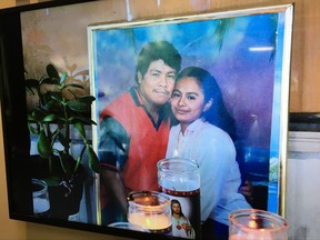 This photo of Ismael Lopez, left, and his wife Claudia, was shown to reporters during a news conference on Friday, July 28, 2017, in Memphis, Tenn. Authorities say Lopez was shot by police in Southaven, Miss. (AP Photo/Adrian Sainz).
