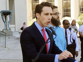 FILE - In this June 21, 2017 file photo, Missouri Attorney General Josh Hawley speaks at a news conference in St. Louis. Missouri Republicans are coalescing around Hawley as their favored candidate to challenge veteran Democratic U.S. Sen. Clair McCaskill in 2018, which would set up a marquee contest between a wily incumbent and a fresh-faced political newcomer in a state that has trended conservative. (AP Photo/Jim Salter File)