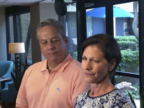 Terri Valenti, right, who will be the NFL's first female instant replay official, and Alberto Riveron, the NFL's new head of officiating, speak to reporters before the start of the annual NFL officiating clinic Friday,  July, 14, 2017 at a hotel in Irving, Texas. Valentini moves into the booth two years after Sarah Thomas became the NFL's first full-time female official on the field, and Riveron was promoted after Dean Blandino left the NFL. (AP Photo/Stephen Hawkins)