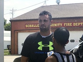 BrIan Pyle, owner of Pyle Transportation Inc., the Iowa trucking company linked to the deadly case of immigrant smuggling in Texas, is interviewed by a television reporter Monday, July 24, 2017, in Schaller, Iowa. The company owned the truck and employed the driver who was found outside a San Antonio Wal-Mart transporting immigrants stuffed inside the trailer. Pyle denied any knowledge of the smuggling operation, saying he had reached a deal to sell the truck to a person in Mexico in May. (AP Photo/Scott McFetridge)