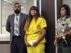 Obdulia Sanchez, 18, middle, appears in a Los Banos, Calif., branch of the Merced County Superior Court on Monday, July 28, 2017, with her public defender, Ramnik Samrao.