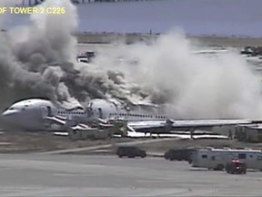 This July 6, 2013, image made from a San Francisco International Airport video shows Asiana flight 214 after it crashed at the airport in San Francisco. The video shows the fiery 2013 crash of a commercial airliner on approach at San Francisco International Airport. (San Francisco International Airport via AP)