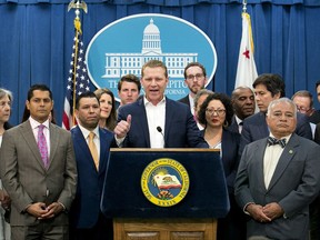 In this photo taken Monday, July 17, 2017, Assembly Republican Leader Chad Mayes, of Yucca Valley, discusses the passage of climate change measure during a news conference in Sacramento, Calif. Mayes and several other Republicans voted to extend California's cap-and-trade program despite opposition from much of the GOP base. (AP Photo/Rich Pedroncelli)