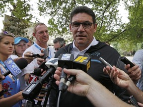 Carolina Panthers NFL football head coach Ron Rivera speaks to the media before the beginning of training camp at Wofford College in Spartanburg, S.C., Tuesday, July 25, 2017. The team has several issues looming including how much Cam Newton will throw and whether Thomas Davis and Greg Olsen will receive contract extensions. (AP Photo/Chuck Burton)