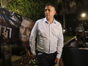 Israeli Avi Gabbay stands in Tel Aviv, Israel, Monday, July 10, 2017. Israel's Labor Party has elected political newcomer Avi Gabbay as its new leader, placing him at the head of the opposition to Prime Minister Benjamin Netanyahu. (AP Photo/Tsafrir Abayov)