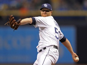 Tampa Bay Rays starter Alex Cobb pitches against the Texas Rangers during the first inning of a baseball game Friday, July 21, 2017, in St. Petersburg, Fla. (AP Photo/Steve Nesius)