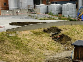 A hole at Domsjo Fabriker after a drainage pipe broke, Monday, July 31, 2017, in Ornskoldsvik north of Sweden, Monday, July 31, 2017.