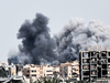 Heavy smoke billows following an airstrike on the western frontline of Raqqa on July 17, 2017, during an offensive by the U.S.-backed Syrian Democratic Forces.