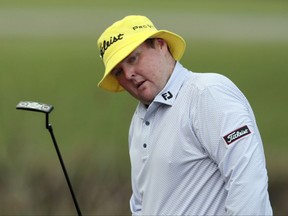FILE - In this April 23, 2015 file photo, Jarrod Lyle, of Australia, reacts after missing a putt on the 17th hole during the first round of the Zurich Classic PGA golf tournament in Avondale, La. Golf Australia issued a statement Wednesday, July 26, 2017 on behalf of the Lyle family, saying the 35-year-old golfer was in Royal Melbourne Hospital for what doctors suspect will be a third fight against acute myeloid leukemia. (AP Photo/Butch Dill, File)