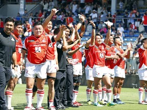 Japan's Sunwolves players celebrate their win after their rugby match against Auckland Blues in Tokyo Saturday, July 15, 2017. (Yohei Fukai/Kyodo News via AP)