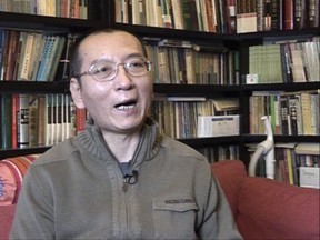 FILE - In this file image taken from Jan 6, 2008, video, Liu Xiaobo speaks during an interview in his home in Beijing, China. The hospital treating ailing Chinese Nobel Peace laureate Liu says his condition is now critical and doctors are in "active rescue" mode for China's best-known political prisoner. The First Hospital of China Medical University said in a statement Monday, July 10, 2017,  that Liu, who has liver cancer, is suffering from a severely swollen stomach, low blood pressure and poor kidney function. An MRI scan also revealed growing cancer lesions.(AP Photo, File)