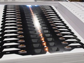 Cardboard frames for solar eclipse glasses are stacked in the American Paper Optics factory in Bartlett, Tenn., on Wednesday, June 21, 2017. The company is one of many businesses _ hotels, campgrounds and stores _ taking advantage of the total solar eclipse _ when the moon passes between Earth and the sun. The moon's shadow will fall in a diagonal ribbon across the U.S., from Oregon to South Carolina. (AP Photo/Adrian Sainz)