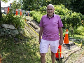Adi Astl, 73, stands at the site of the stairs he built last June in Tom Riley Park, in Toronto on Friday, June 21, 2017. The city of Toronto removed the steps Friday morning, citing safety concerns, but promised to install a new set by the end of next week. THE CANADIAN PRESS/Brennan Doherty