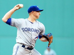 Toronto Blue Jays pitcher Aaron Sanchez throws to first base against the Boston Red Sox on July 19.