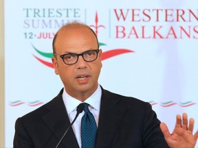 Italian Foreign Minister Angelino Alfano talks during his press conference prior a Western Balkans summit in Trieste, Italy, Tuesday, July 11, 2017. (Andrea Lasorte/ANSA via AP)