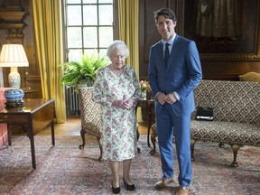 Prime Minister Justin Trudeau meets Queen Elizabeth at Holyrood Palace her official residence in Edinburgh on Wednesday, July 5, 2017. THE CANADIAN PRESS/Ryan Remiorz