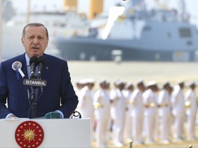 Turkey's President Recep Tayyip Erdogan, delivers a speech during the launch of a new Turkish Navy ship, in Tuzla, outside Istanbul, Monday, July 3, 2017. (Presidency Press Service via AP, Pool)