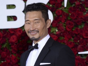 FILE - In this June 12, 2016, file photo, Daniel Dae Kim arrives at the Tony Awards at the Beacon Theatre in New York.  Kim said in a Facebook post Wednesday, July 5, 2017, his decision to leave "Hawaii Five-O" stemmed from a contract dispute. (Photo by Charles Sykes/Invision/AP, File)
