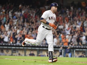 Houston Astros' Carlos Beltran rounds the bases after hitting a two-run home run off Seattle Mariners starting pitcher Ariel Miranda during the sixth inning of a baseball game, Monday, July 17, 2017, in Houston. (AP Photo/Eric Christian Smith)