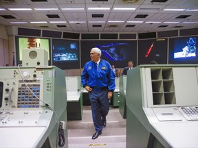 FILE - In this Wednesday, June 7, 2017 file photo, Vice President Mike Pence tours the historic Mission Control at the Johnson Space Center in Houston, after welcoming in a new class of astronauts. On Thursday, Kuly 6, 2017, Pence, who is leading a newly revived National Space Council, will address employees at NASA's Kennedy Space Center in Cape Canaveral, Fla. (Michael Ciaglo/ Houston Chronicle via AP)