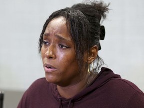 Latasha Nelson speaks at a news conference Thursday, July 13, 2017, at the Next Generation Action Network in Dallas. Nelson says police in the Dallas suburb of Arlington offered to drop charges against her two teenage sons in exchange for a cellphone video she shot that allegedly shows an officer needlessly pushing her older son to the ground and arresting him. (AP Photo/Jaime Dunaway)