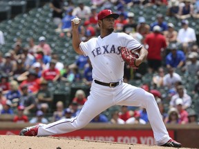 Texas Rangers starting pitcher Yu Darvish works the second inning of a baseball game against the Los Angeles Angels in Arlington, Texas, Sunday, July 9, 2017. (AP Photo/ Richard W. Rodriguez)