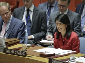 United States U.N. Ambassador Nikki Haley, right, speaks during United Nations Security Council meeting on North Korea's latest launch of an intercontinental ballistic missile, Wednesday July 5, 2017 at U.N. headquarters. (AP Photo/Bebeto Matthews)