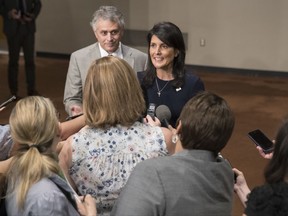 American Ambassador to the United Nations Nikki Haley, center, speaks to reporters after leaving a Security Council meeting on the situation in the Middle East, including the Palestinian question, Tuesday, July 25, 2017 at United Nations headquarters. (AP Photo/Mary Altaffer)