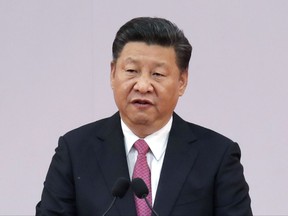 FILE - In this Saturday, July 1, 2017, file photo, Chinese President Xi Jinping speaks after administering the oath for the Hong Kong's new Chief Executive Carrie Lam at the Hong Kong Convention and Exhibition Center in Hong Kong. The White House said Sunday that President Donald Trump has spoken with the leaders of China and Japan and reaffirmed their shared commitments to dealing with North Korea. (AP Photo/Kin Cheung, File)