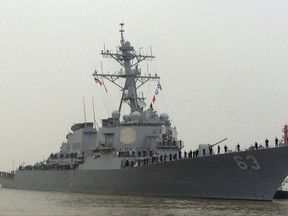 In this Nov. 16, 2015, file photo, U.S. Navy guided missile destroyer USS Stethem arrives for a scheduled port visit in Shanghai, China. The USS Stethem in the South China Sea sailed near a tiny island disputed by three Asian governments as part of an operation affirming the right to passage, a U.S. defense official said Sunday, July 2, 2017. (AP Photo/Paul Traynor, File)