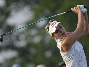 Lexi Thompson tees off on the 10th hole during the first round of the U.S. Women's Open Golf tournament Thursday, July 13, 2017, in Bedminster, N.J. (AP Photo/Seth Wenig)