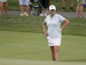 Cristie Kerr of the United States lines up a shot onto the 15th green during the first round of the U.S. Women's Open Golf tournament Thursday, July 13, 2017, in Bedminster, N.J. (AP Photo/Seth Wenig)
