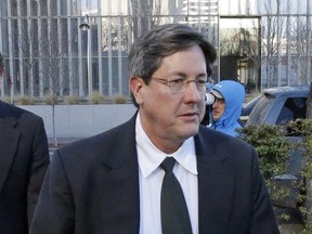 FILE - This Jan. 21, 2015 file photo, Lyle Jeffs leaves the federal courthouse in Salt Lake City. Jeff, a polygamous sect leader captured after nearly a year on the run is due back in a federal courtroom in Utah. Jeffs is set to be arraigned Monday, July 10, 2017, on a felony count connected to his time as a fugitive as well as charges filed in a suspected multimillion food-stamp fraud scheme. (AP Photo/Rick Bowmer, File)