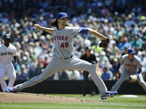 New York Mets starting pitcher Jacob deGrom throws against the Seattle Mariners in the first inning of a baseball game, Saturday, July 29, 2017, in Seattle. (AP Photo/Ted S. Warren)