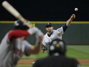 Seattle Mariners starting pitcher James Paxton pitches to Boston Red Sox's Deven Marrero in the fifth inning of a baseball game, Monday, July 24, 2017, in Seattle. (AP Photo/Ted S. Warren)