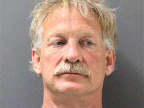 In this photo released by the Yavapai County Sheriff's Office shows suspect Gene Alan Carpenter, 54, in Prescott Valley, Ariz., Carpenter who is accused of flying a drone over a major Arizona wildfire has been arrested, with authorities saying he interrupted firefighting efforts on a blaze that has forced thousands of people from their homes. The Yavapai County Sheriff's Office said Saturday, July 1, 2017, that Carpenter of Prescott Valley, was in custody on charges of endangerment and unlawful operation of an unmanned aircraft. (Yavapai County Sheriff's Office via AP)