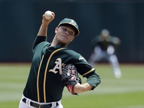 Oakland Athletics starting pitcher Sonny Gray throws to the Chicago White Sox during the second inning of a baseball game Wednesday, July 5, 2017, in Oakland, Calif. (AP Photo/Marcio Jose Sanchez)