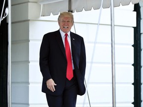 President Donald Trump, leaves the White House in Washington, Saturday, July 22, 2017, for a trip to Norfolk, Va., to participate in the commissioning ceremony for the nuclear-powered aircraft carrier USS Gerald R. Ford. (AP Photo/Manuel Balce Ceneta)