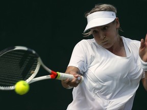 Bethanie Mattek-Sands of the United States returns to Romania's Sorana Cirstea during their Women's Singles Match on day four at the Wimbledon Tennis Championships in London Thursday, July 6, 2017. (AP Photo/Alastair Grant)