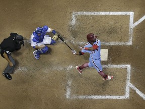 Philadelphia Phillies' Odubel Herrera hits a home run during the seventh inning of a baseball game against the Milwaukee Brewers Saturday, July 15, 2017, in Milwaukee. (AP Photo/Morry Gash)