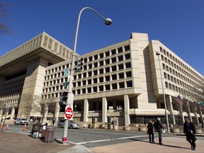 FILE - In this Feb. 3, 2012 file photo, the Federal Bureau of Investigation (FBI) headquarters in Washington. The government is scrapping a decade-long plan to shutter the FBI's deteriorating downtown Washington headquarters and look for a new building in Maryland or Virginia. (AP Photo/Manuel Balce Ceneta, File)
